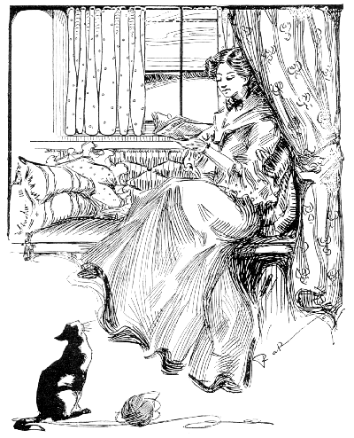 woman reading with cat
