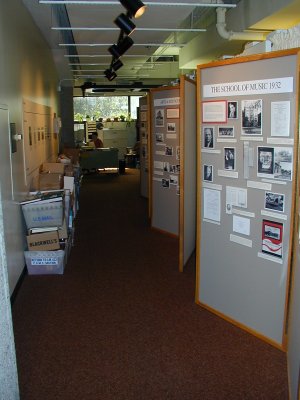 UARC entry hall: a UofL historical display on the right, unprocessed gifts on the left. Photo by Bill Carner